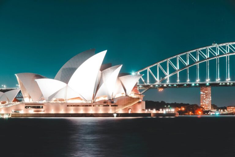 Sydney, the vibrant capital of New South Wales, Australia, is renowned for its stunning harborfront, iconic landmarks, and diverse cultural scene. The city is home to the world-famous Sydney Opera House, with its distinctive sail-like design, and the Sydney Harbour Bridge, offering panoramic views of the sparkling harbor. Visitors can enjoy the golden sands of Bondi Beach, explore the historic Rocks district, or wander through the Royal Botanic Garden. Sydney's cosmopolitan atmosphere is enriched by its lively arts scene, diverse culinary offerings, and dynamic neighborhoods, making it a must-visit destination for travelers seeking both adventure and relaxation.
